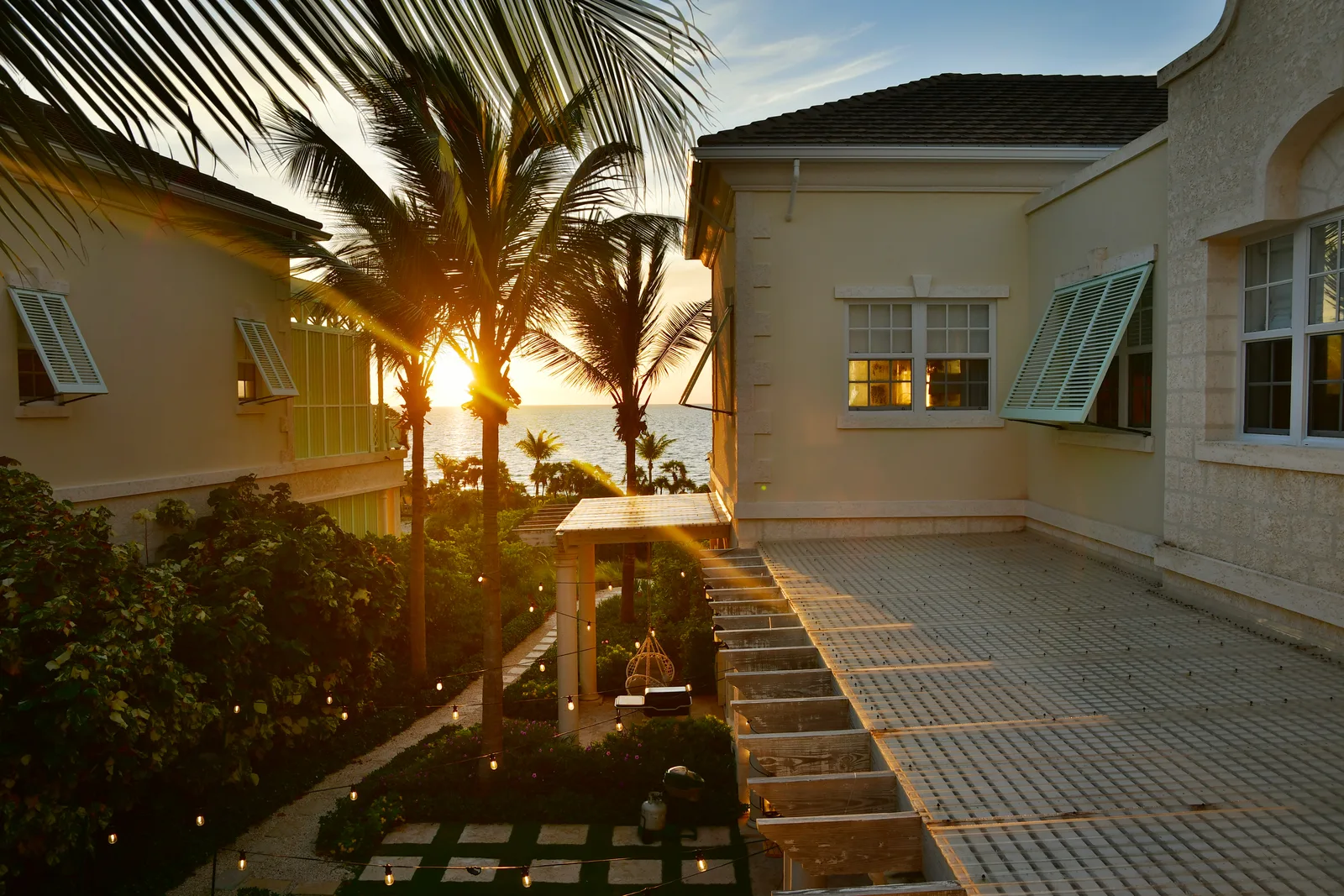 Sunset over the roof of Villa One and the sea