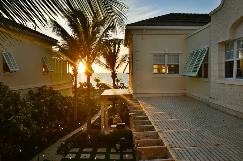 Sunset over the roof of Villa One and the sea