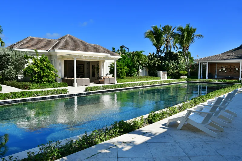 A long lap pool and its pavilion