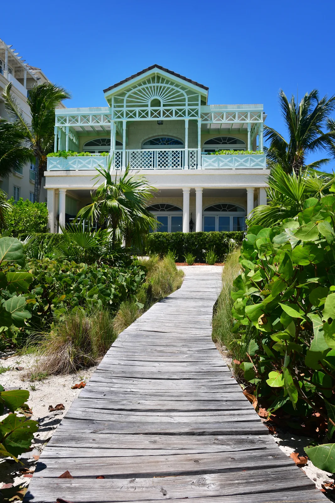 The boardwalk from the beach to the villa