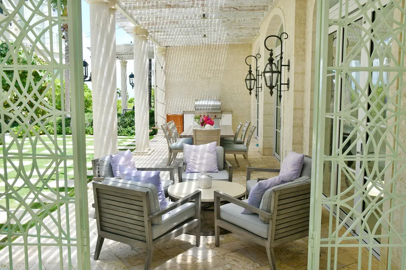The terrace lounge behind its white trellis