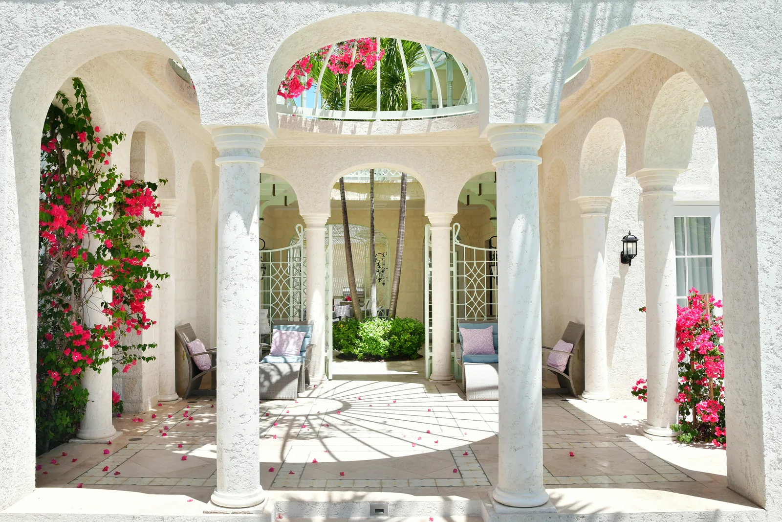 Arches and bougainvillea in the courtyard