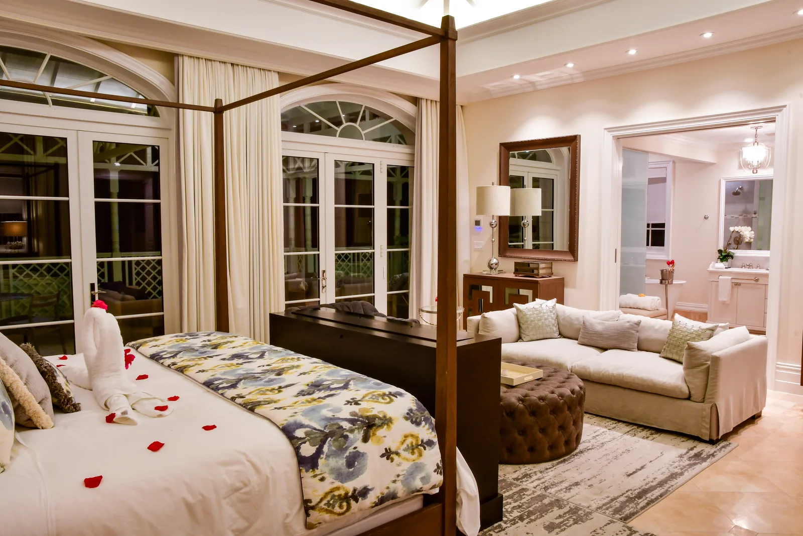 The master suite in the evening, petals on the bed