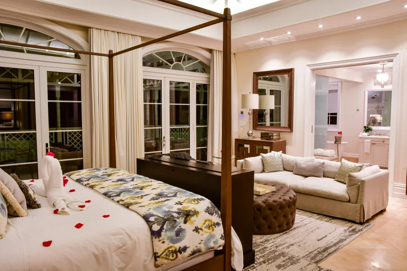 The master suite in the evening, petals on the bed